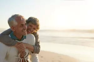 Senior couple having fun at the beach